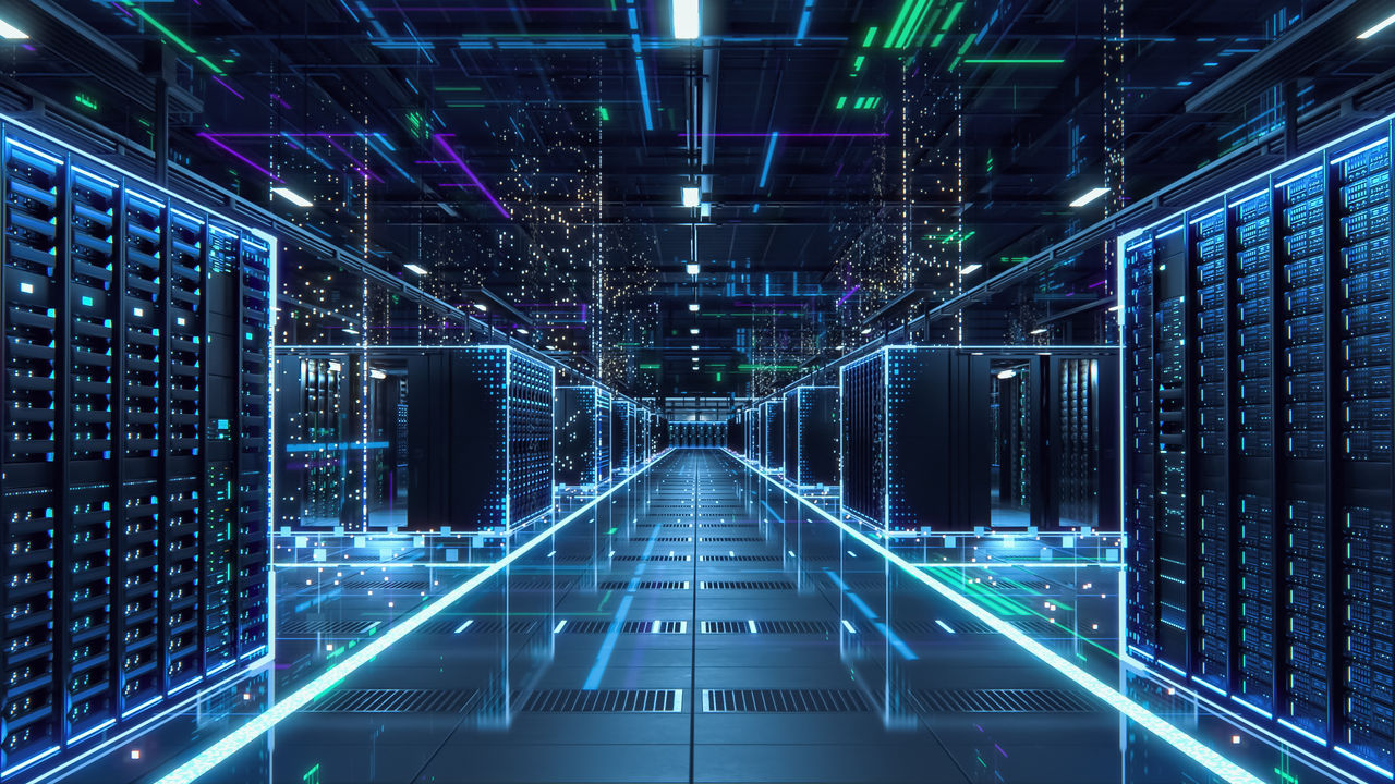 AI data center with glowing server racks representing artificial intelligence in journalism